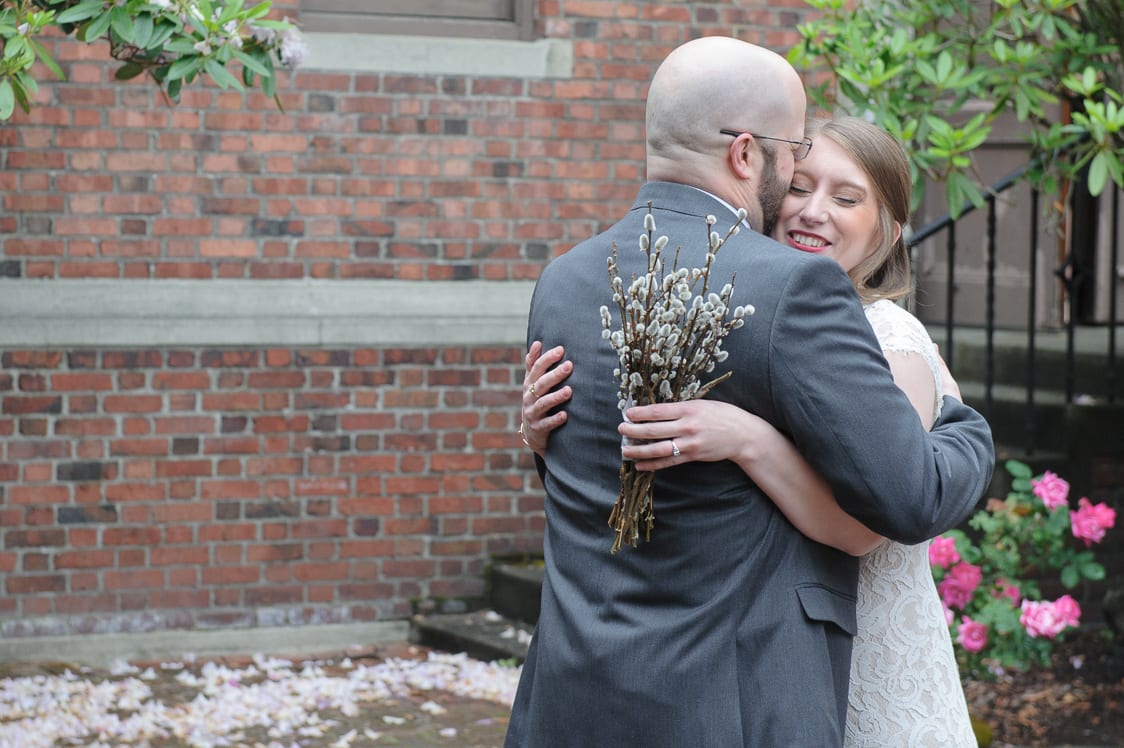 Bride and groom hug at the First Presbyterian Church in Tacoma