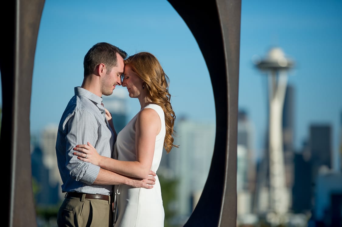 Romantic picture of couple touching foreheads in Seattle