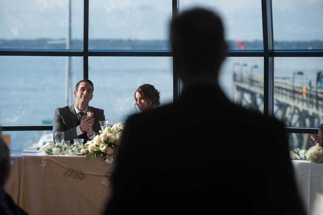 Groom clapping his hands at the Bellingham Cruise Terminal