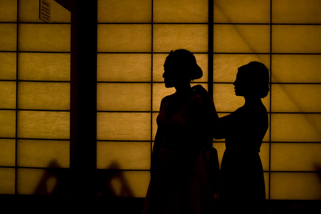 Silhouette of bride and her sister at the Pickering Barn in Issaquah, WA