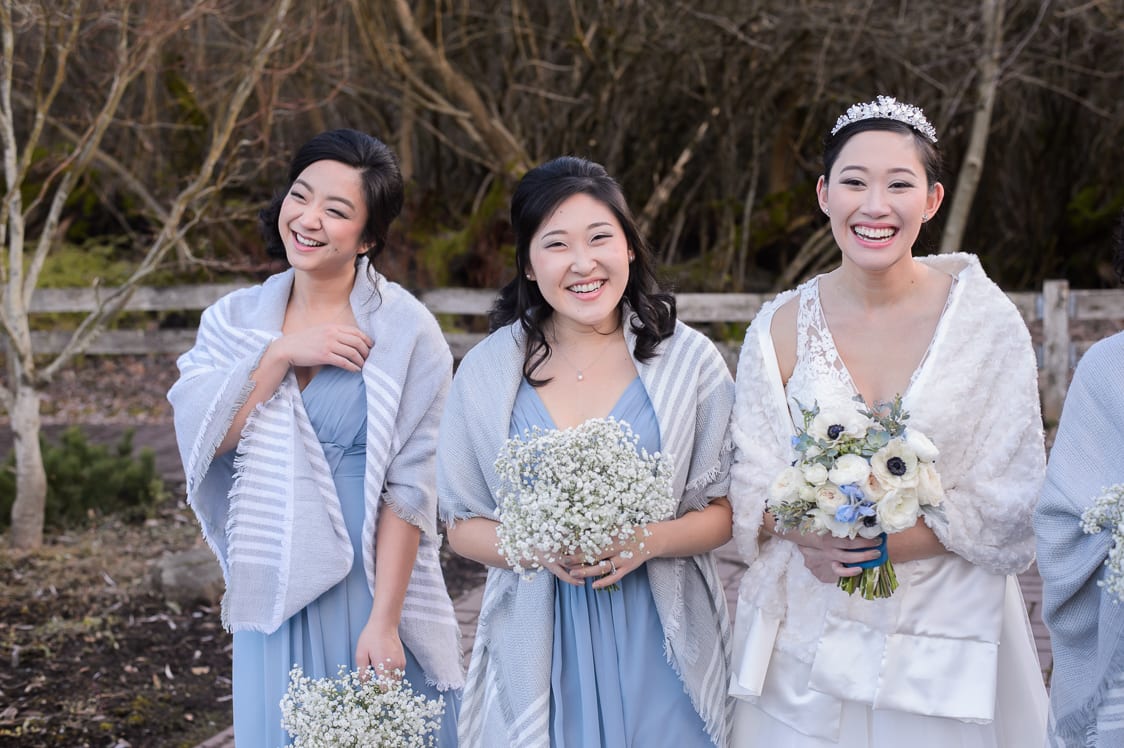 Candid picture of bridesmaids laughing at the Pickering Barn in Issaquah, WA