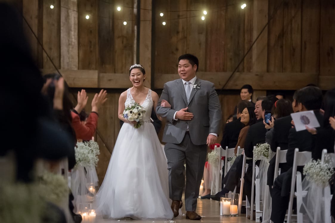 Bride and groom recessional at the Pickering Barn in Issaquah, WA