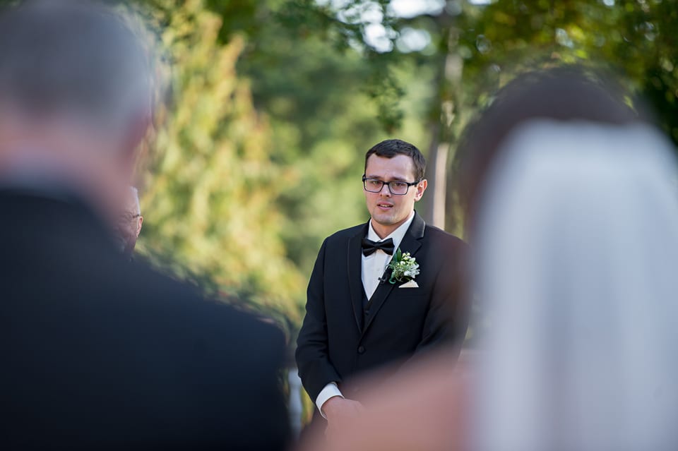 Groom is emotional as bride comes down the aisle