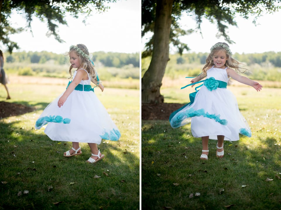 Flowergirl twirlilng her dress at Selene Homestead