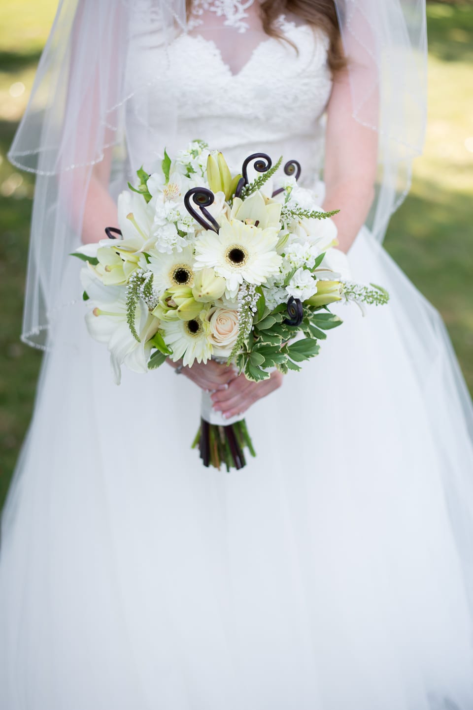 Bride holding her bridal bouquet at Selene Homestead