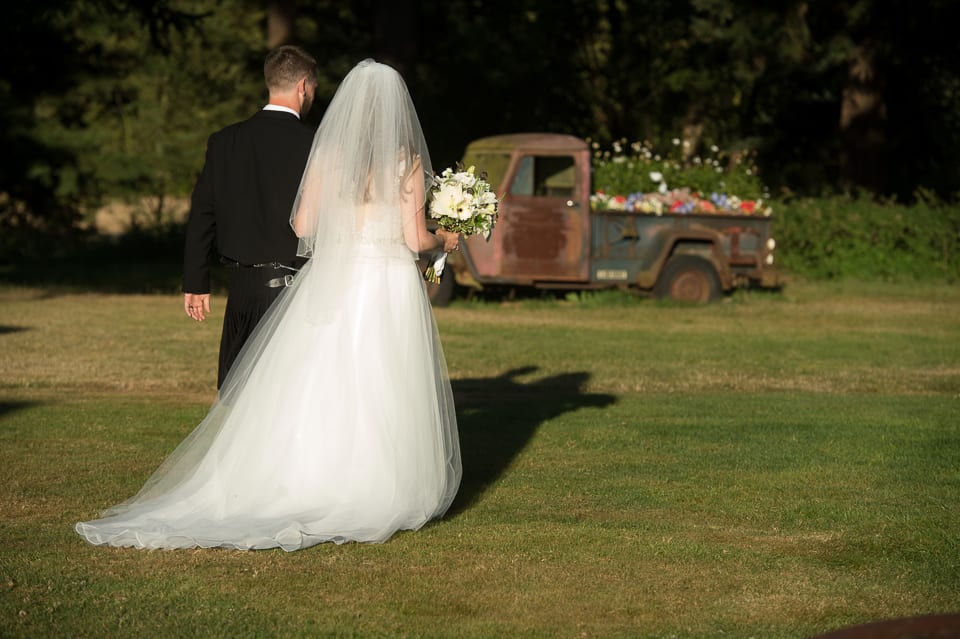 Bride and groom walk away after getting married at Selene Homestead