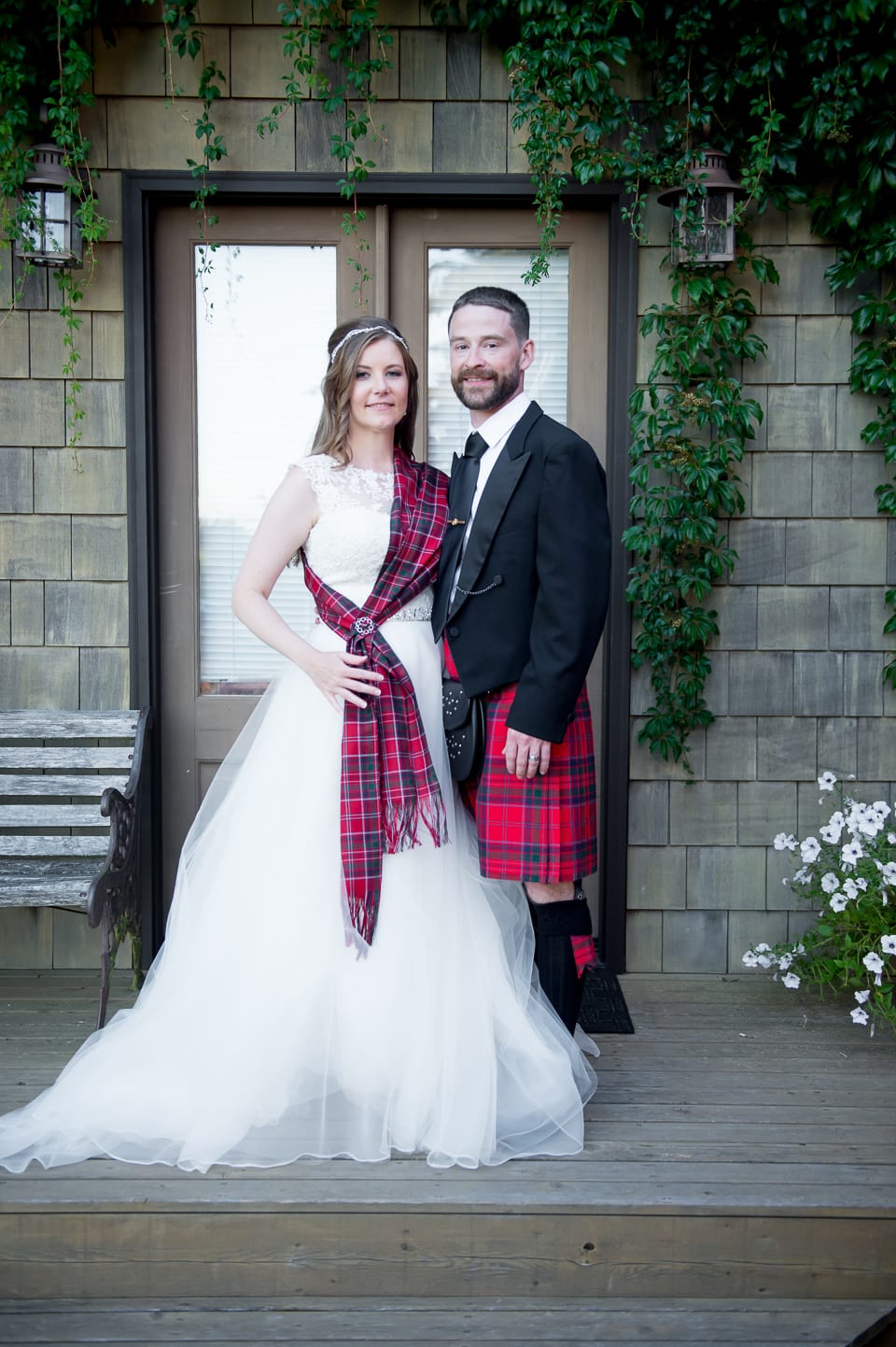 Bride and groom in traditional Scottish attire at Selene Homestead