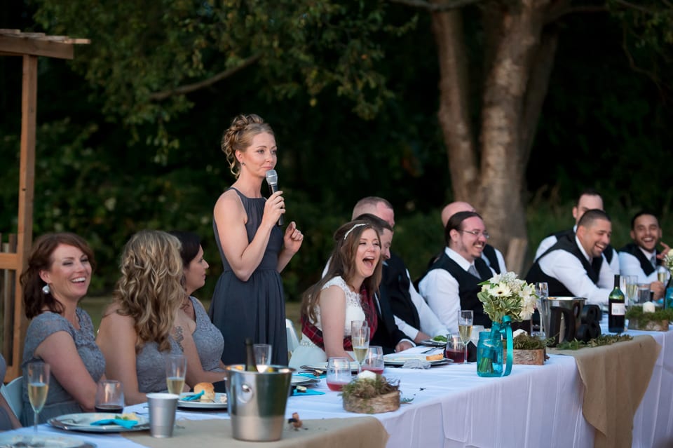 Everyone laughing at maid of honor toast at Selene Homestead