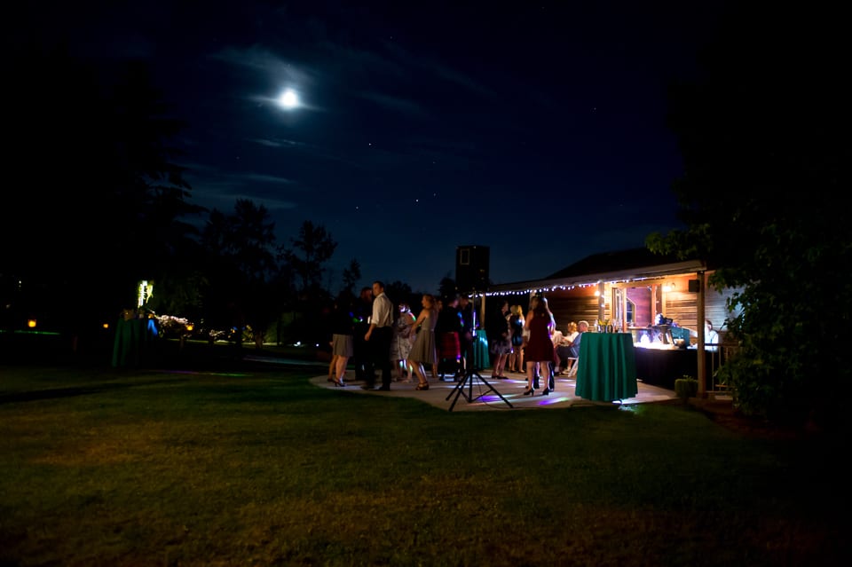 Moonlit open dancing during wedding reception Selene Homestead