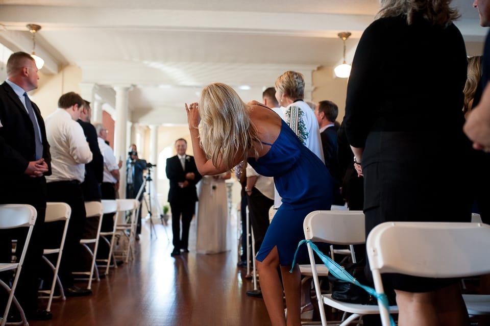 Guest in the way as bride walks down the aisle-unplugged wedding
