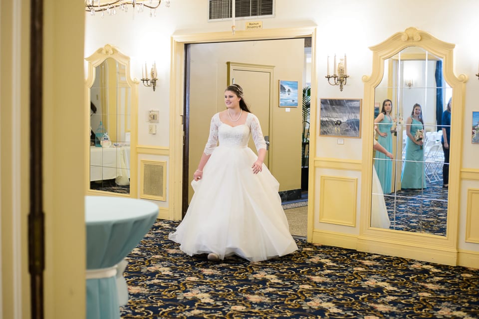 Bride entering ballroom at the Leopold Crystal Ballroom