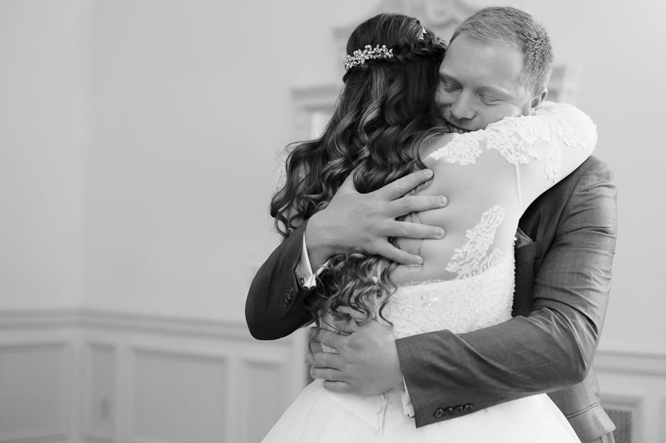 Beautiful moment between bride and groom at the Leopold Crystal Ballroom
