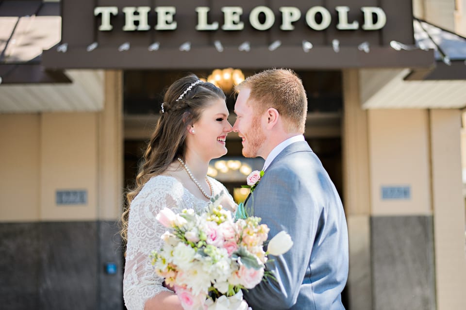 Bride and groom in front of the Leopold Crystal Ballroom