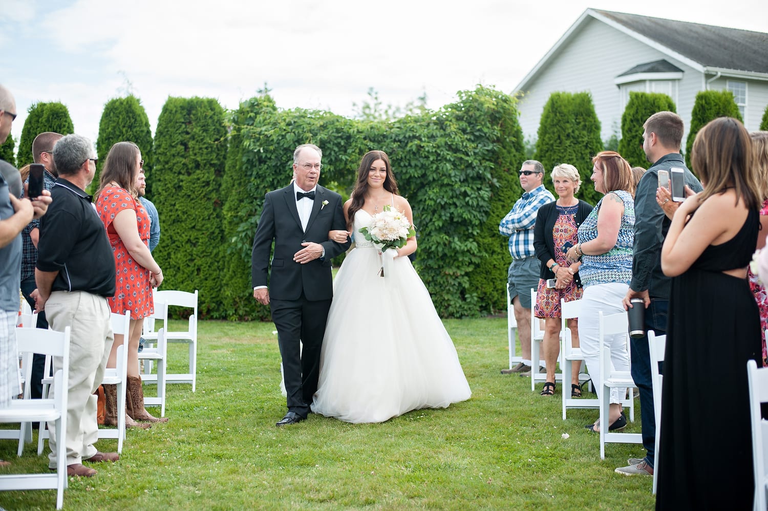 bride walking down the aisle at Axton Events Bellingham wedding venue