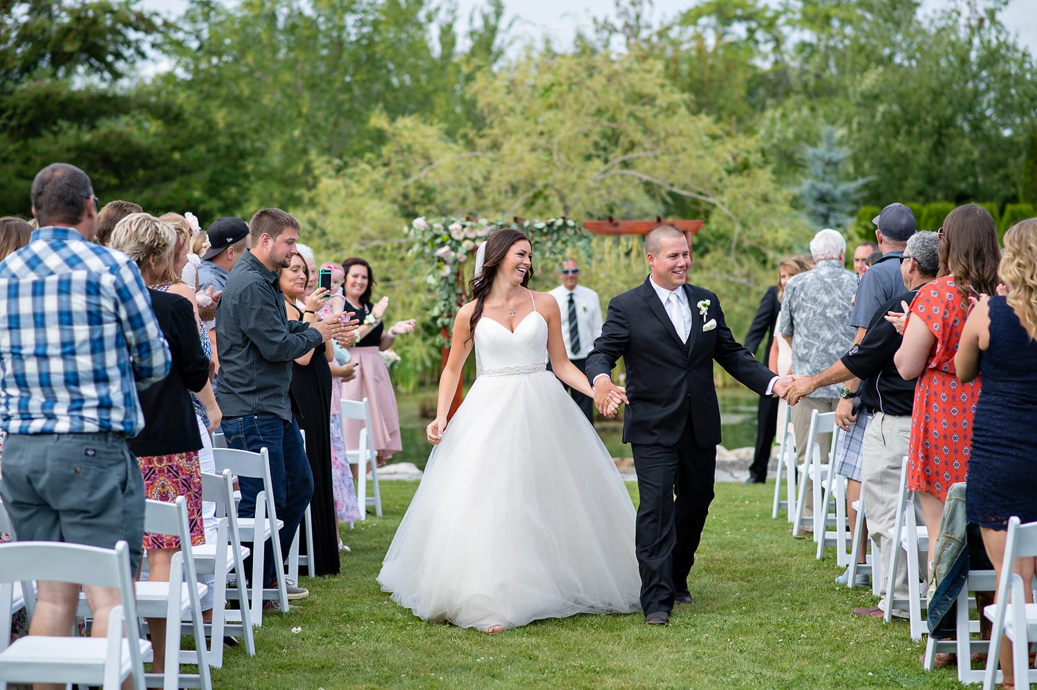 Bride and groom celebrate at Axton Events Bellingham wedding venue